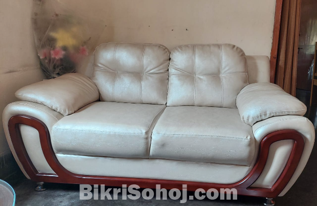 Two seater white sofa
